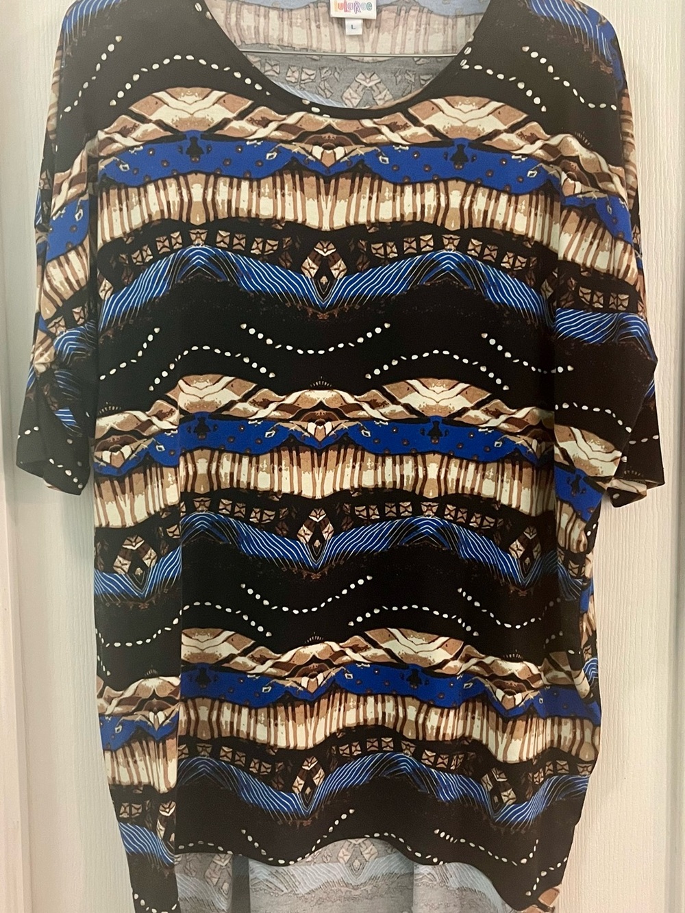 LuLaRoe Irma Size Large. Black Blue Brown Patterned Short Sleeve Casual Top.